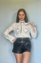 Load image into Gallery viewer, Reworked white lace black bow angel sleeve blouse. S M