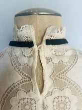 Load image into Gallery viewer, Reworked white lace black bow angel sleeve blouse. S M