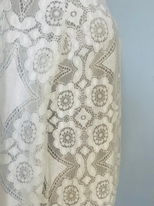 Reworked white lace black bow angel sleeve blouse.  S  M
