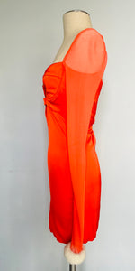 Redesigned cutout orange fitted mini dress.  S M